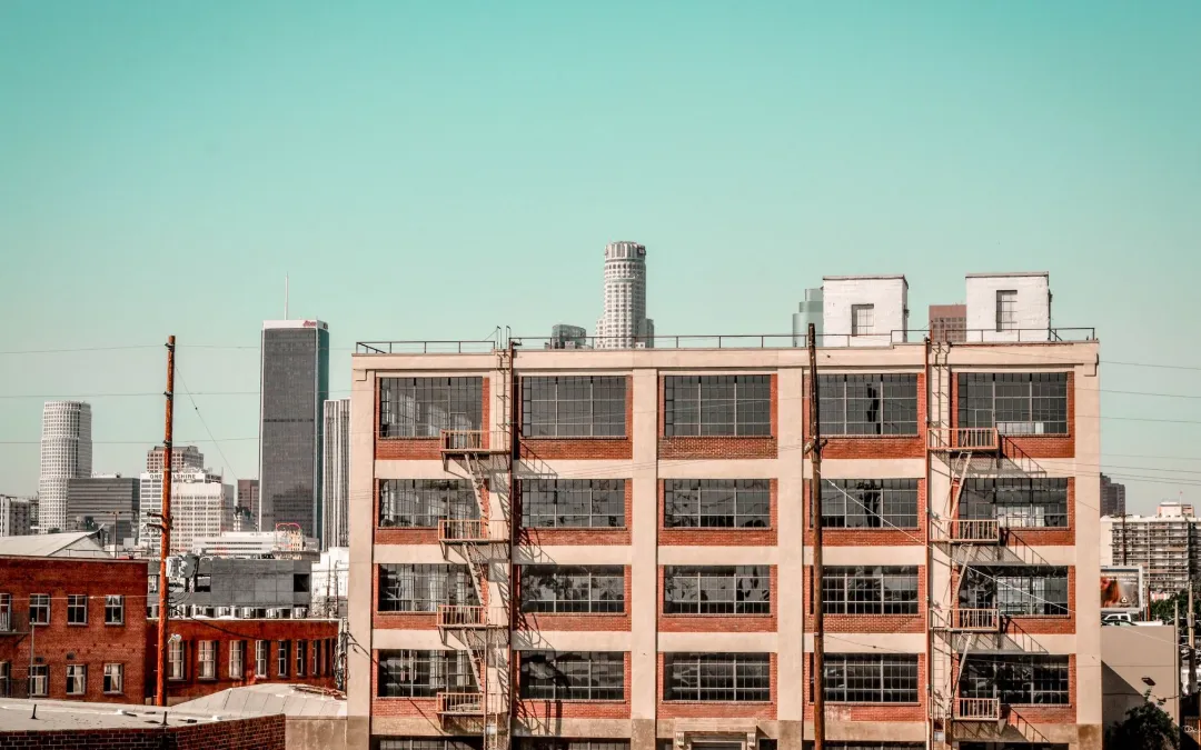 Commercial buildings against the Los Angeles skyline on a clear day